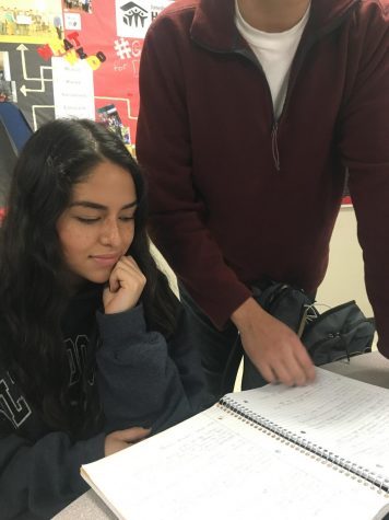 Wendy Cazares studies with Javier Amperez on Monday in The Commons.
